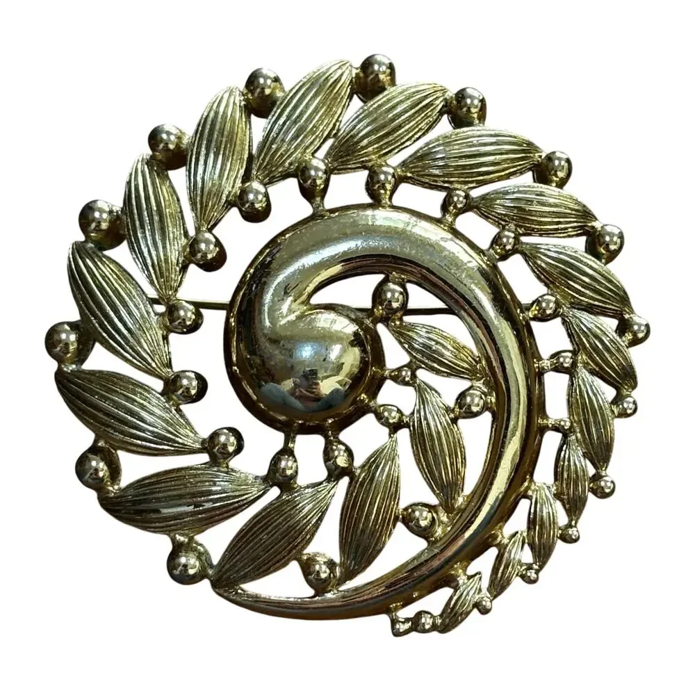 Vintage Monet brooch goldtone ornate filigreee circle medallion chunky 80s